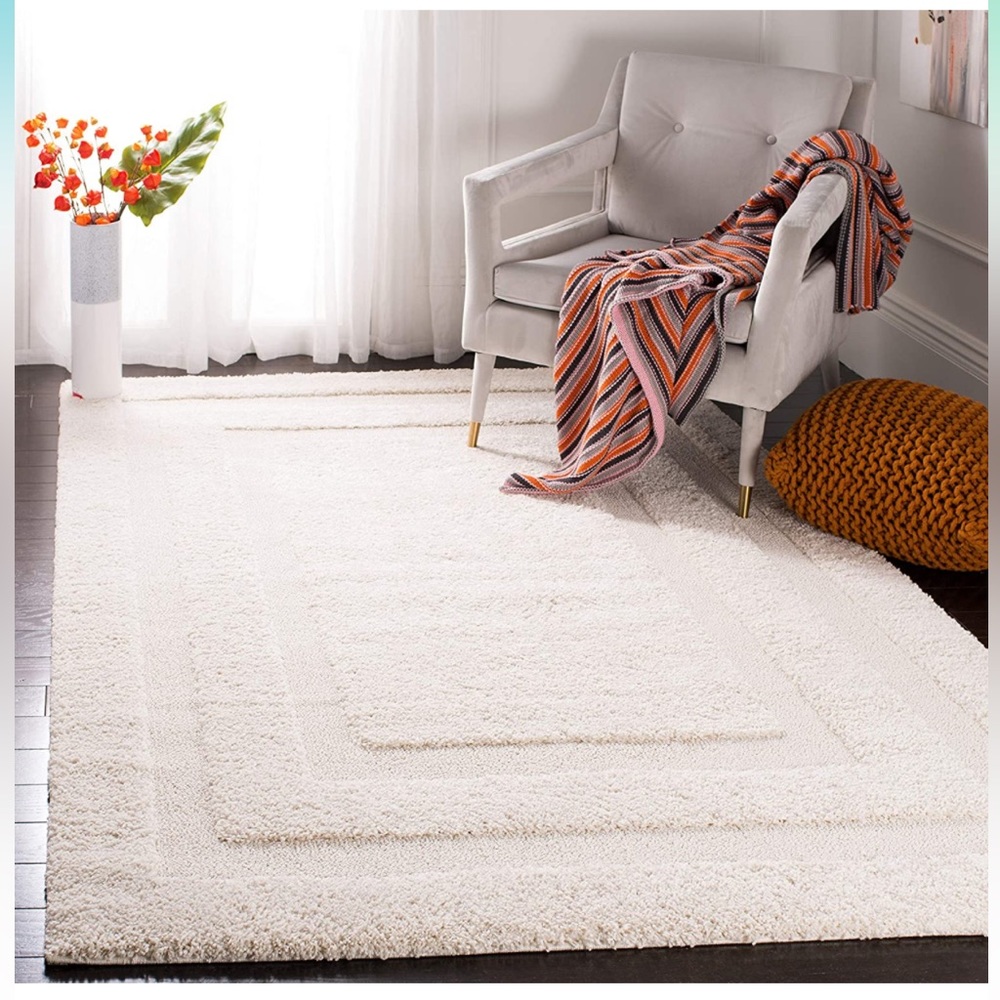 Safavieh 9 ft 6 in X 13 ft cream rug NEVER opened.
